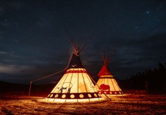 Tipi and sky full of stars